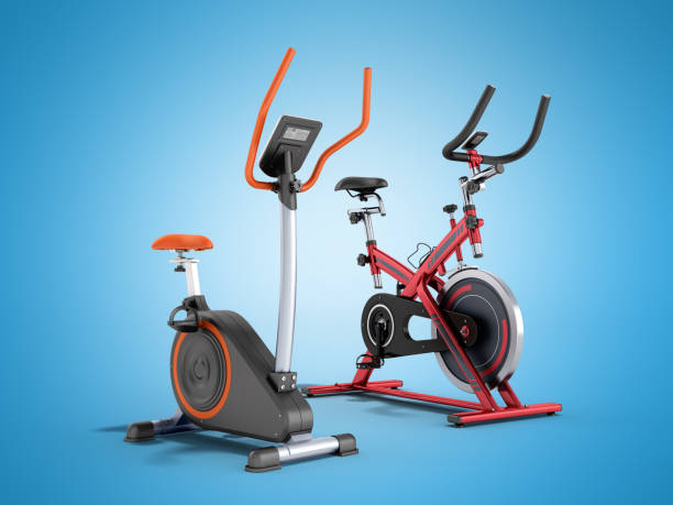 istock Two modern sport exercise bike yellow purple 3d render on blue background 875962160