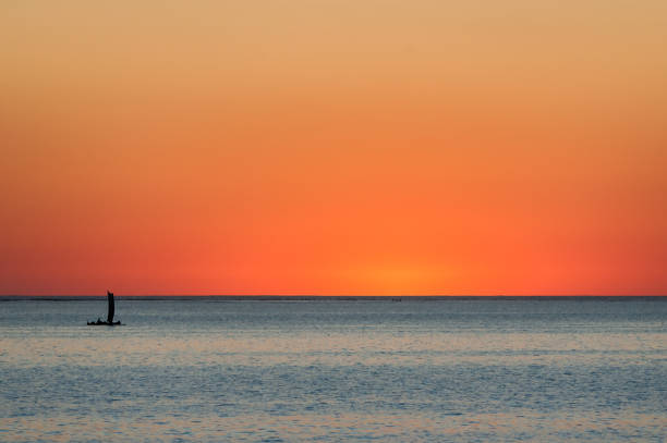 Malagasy fishing sailboat at sunset in southwestern Madagascar