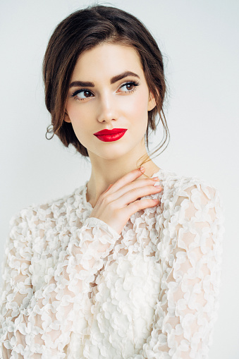 Studio shot of young beautiful woman