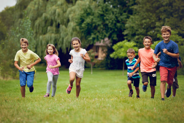 istock Group of Children Running 875976502