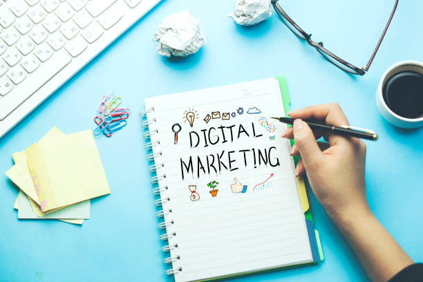 istock woman written digital marketing text on desk 875983538