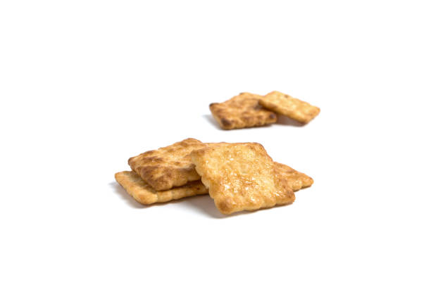 istock Pile sugar crackres on isolated white background 876000922