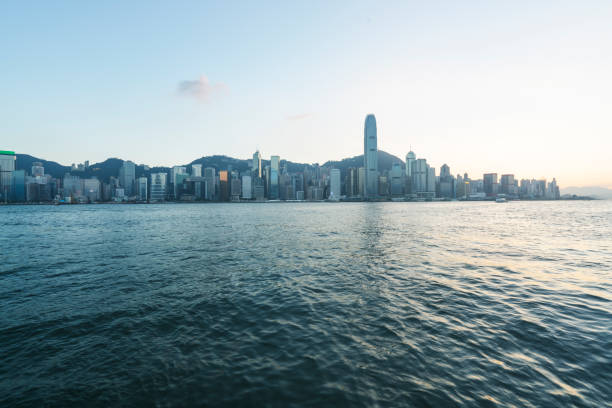 istock Hong Kong skyline against blue sky 876010610