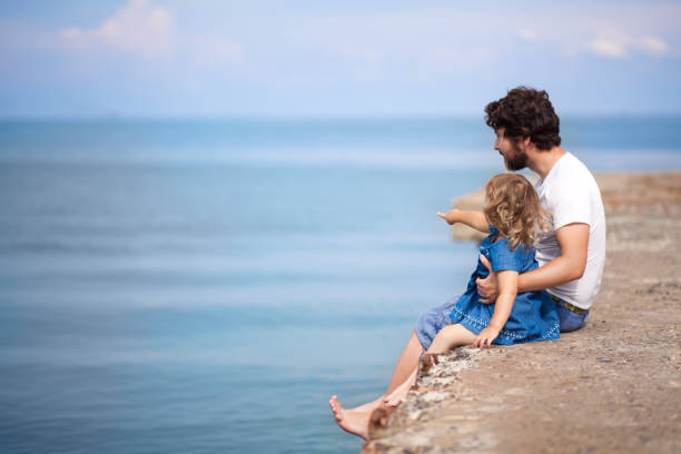 istock Father and daughter, summer vacations. 876014382