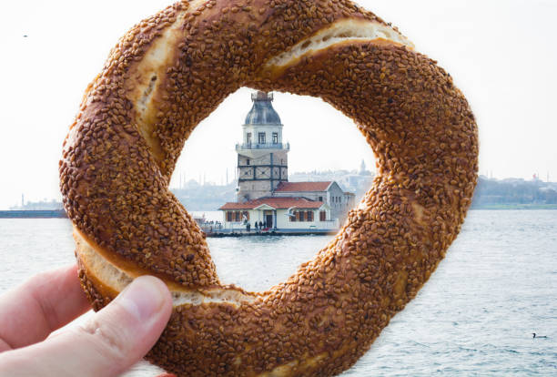 istock turkish bagel simit and maidens tower in istanbul turkey 876016262