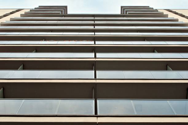 istock Modern apartment buildings on a sunny day with a blue sky. 876020060