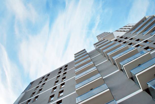 istock Modern apartment buildings on a sunny day with a blue sky. 876020222