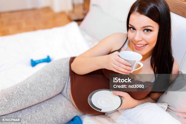 Beautiful Pregnant Woman Drinking Tea Stock Photo - Download Image Now - 30-39 Years, Abdomen, Adult