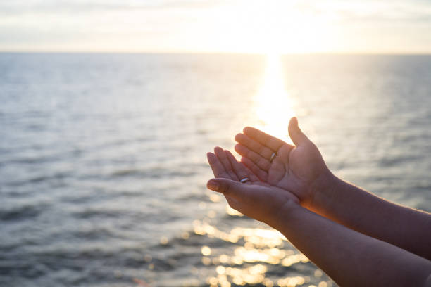 istock Human hands open palm up worship. Eucharist Therapy Bless God Helping Repent Catholic Easter Lent Mind Pray. Christian concept background. 876041412