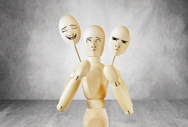 istock Man on stage can not choose a cheerful or sad mask 876044976