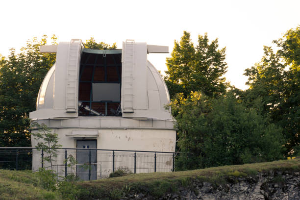 istock Open white dome of a large telescope in the Observatory in Krakow 876060216