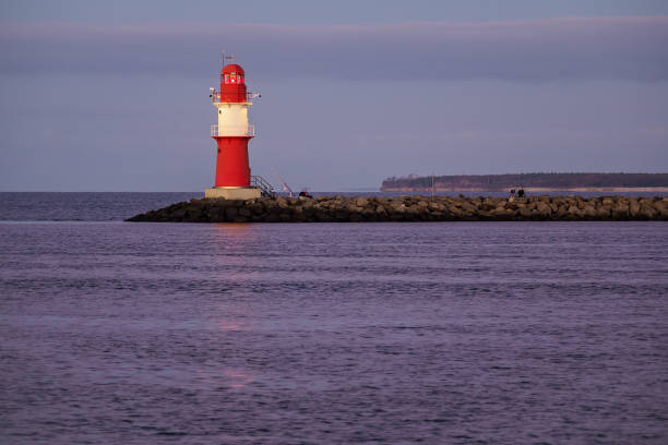 istock Mole on the Baltic Sea coast in Warnemuende, Germany 876060718