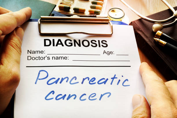 Pancreatic cancer diagnosis on a medical form. Pancreatic cancer diagnosis on a medical form. adenocarcinoma photos stock pictures, royalty-free photos & images