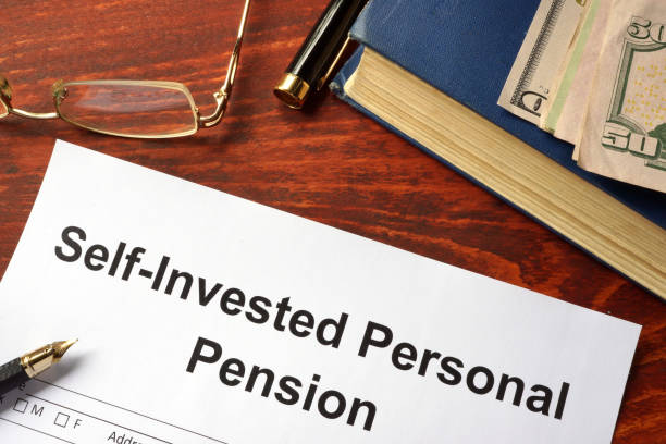 istock Self-Invested Personal Pension (SIPP) form on an office table. 876068534
