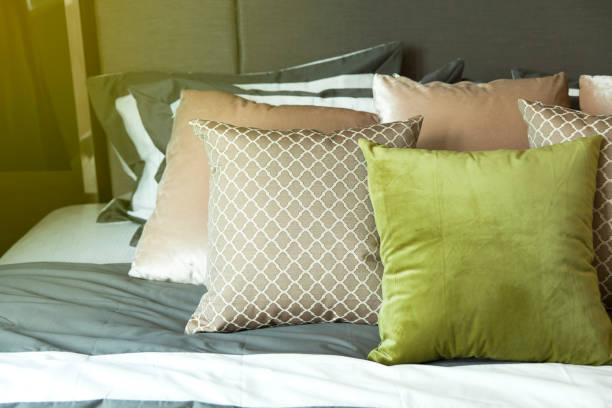 istock luxury bedroom with cozy cushion 876072104