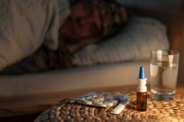 istock A man lie with cold in your bed 876077762