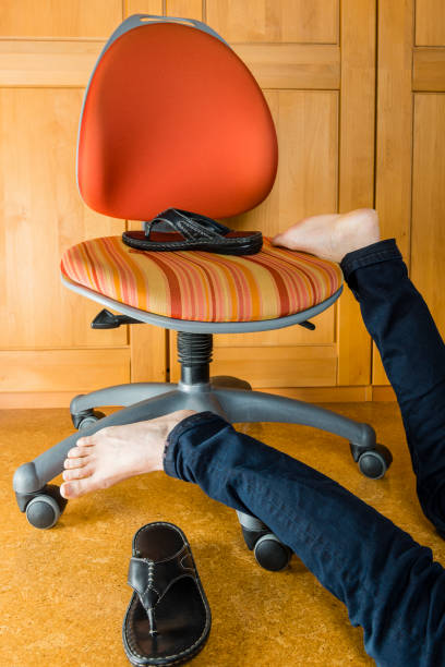istock Accident - woman falling from a stool at home 876081264