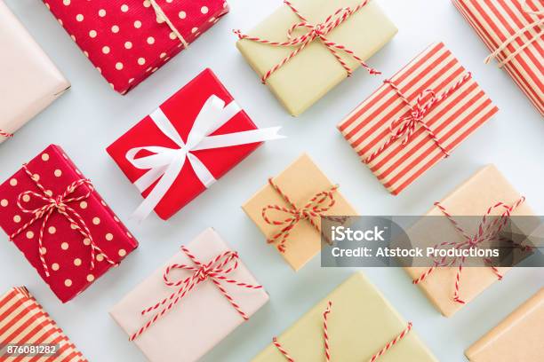 Set Of Christmas And New Year Holiday Gift Boxes On Light Blue Background Flat Lay Design Stock Photo - Download Image Now