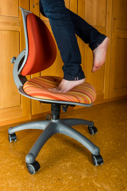 istock Accident - woman falling from a stool at home 876081324