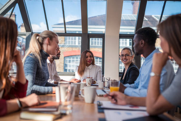 istock Colleagues at a small conference room 876099462
