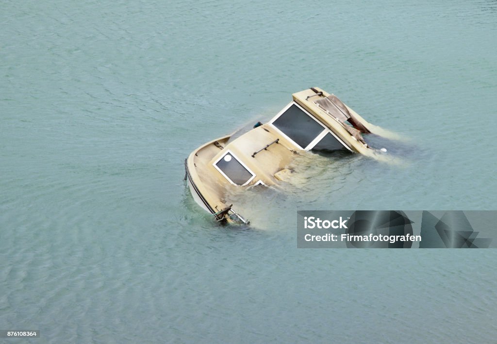 Sinking boat Nautical Vessel Stock Photo
