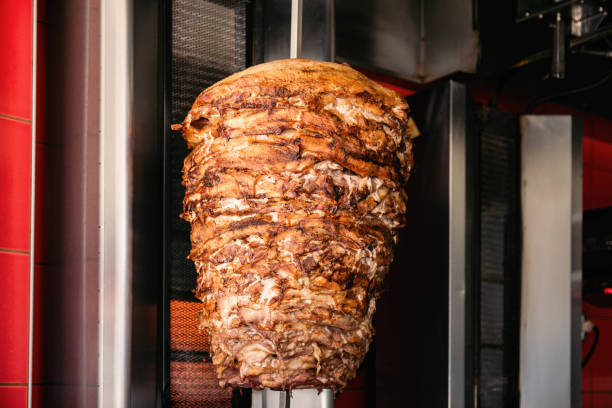 Doner Kebab On Rotating Vertical Spit stock photo