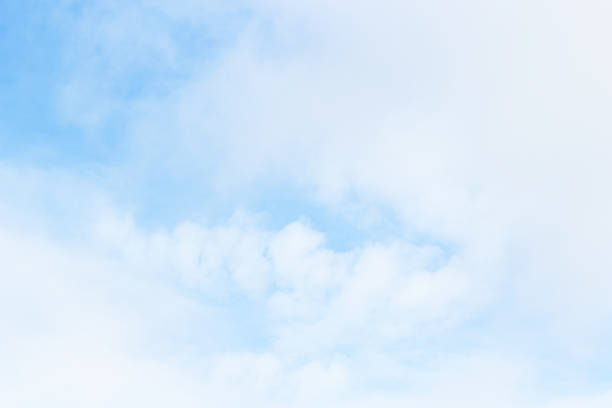 istock Soft white clouds against blue sky background and empty space for your design, beautiful of nature 876118308
