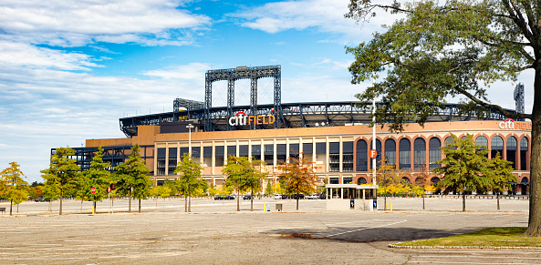 Queens Citifield stadium panorama with empty parking lot.