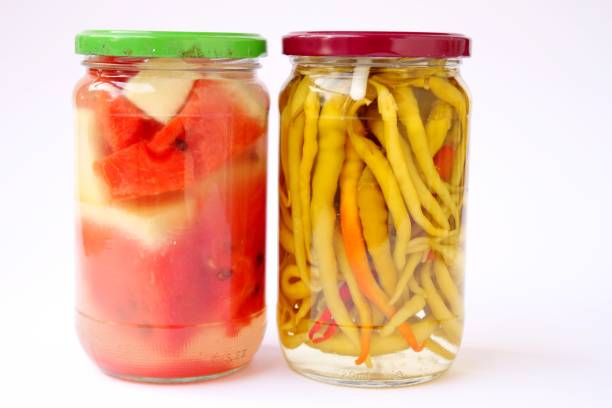istock Pickled watermelon and peppers in glass jars 876134038