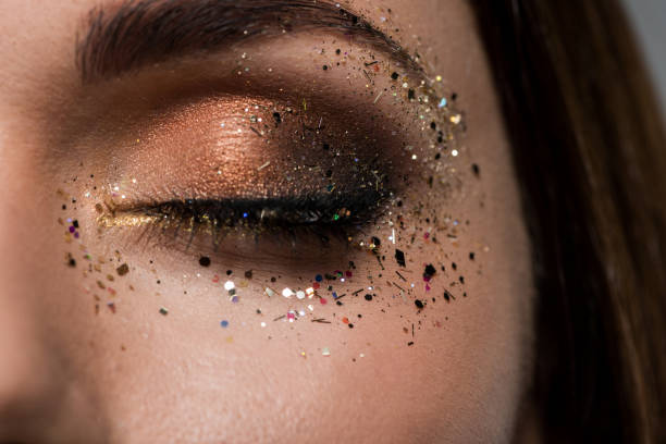 istock woman with gloss around eye 876149538