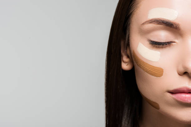 istock woman with tonal foundation on face 876149976
