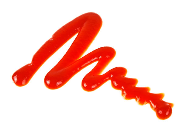 istock Ketchup splash isolated on a white background 876158956
