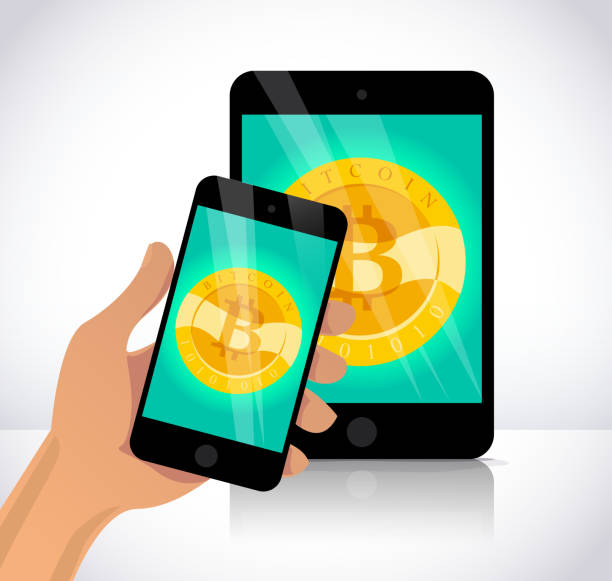 istock Vector illustration with smartphone and tablet having golden coin with bitcoin emblem on its screen isolated on white background. 876159016