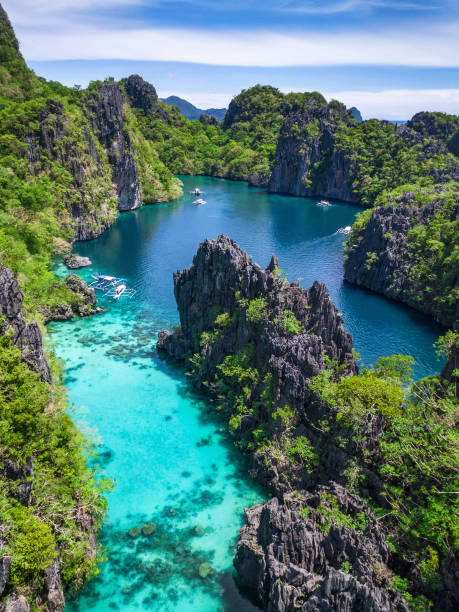 El Nido, Palawan, Philippines, Aerial View of Beautiful Lagoon and Limestone Cliffs Aerial view of beautiful lagoon and limestone cliffs in El Nido, Palawan, Philippines. philippines stock pictures, royalty-free photos & images