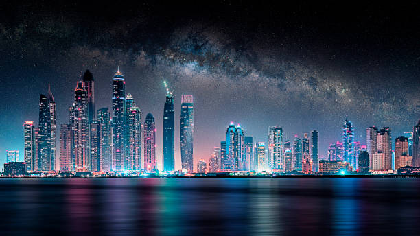 istock Dubai city under the milky way 876173806