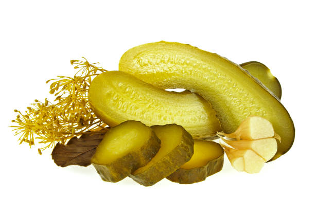 istock Pickled cucumber slices and spices on a white background 876177672
