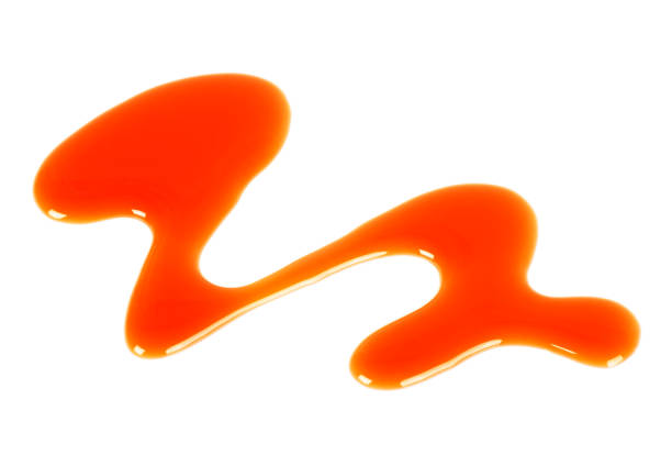 istock Sweet caramel sauce isolated on a white background 876177722