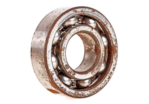 istock Old rusty bearing isolated on a white background, closeup 876177892