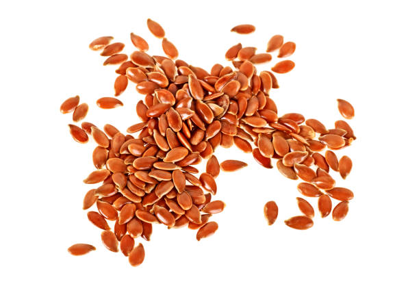 istock Flax seeds isolated on white background, close up 876186802