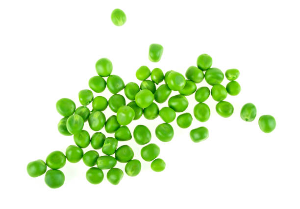 istock Green peas isolated on a white background. Top view. 876187066