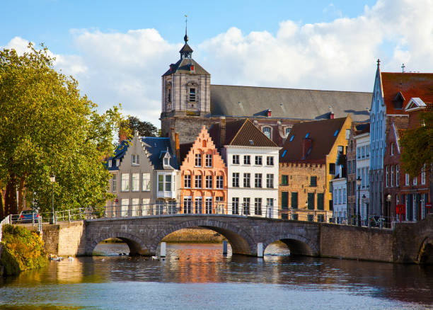 istock Classic view of channels of Bruges 876192778