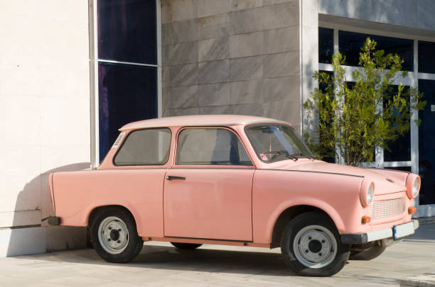 istock Old East German pink car 876195162