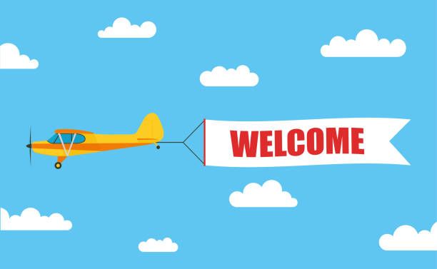 летающий рекламный баннер, вытянутый легким самолетом с надписью "welcome" - стоковой вектор. - aircraft point of view stock illustrations