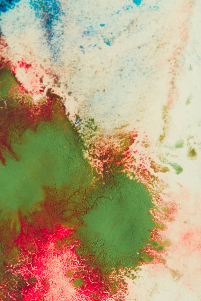 istock mixing of paints different colors on a white paper 876202702