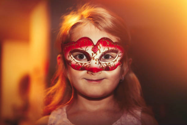 Super funny girl looking at camera on white background.