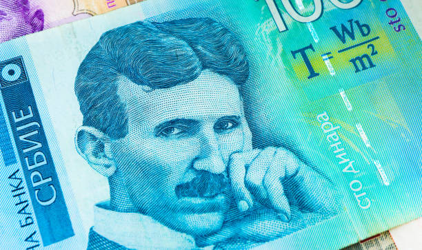 Serbian 100 dinara currency banknote, close up. Serbia money RSD dinar cash, macro view, portrait of scientist Nikola Tesla. dinar stock pictures, royalty-free photos & images