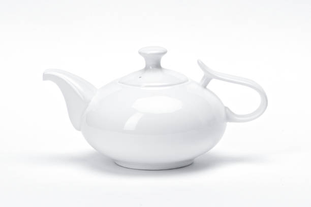 istock blank template porcelain tableware for your design, white ceramic teapot  white background 876219710