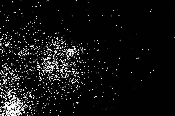 istock Abstract grainy texture isolated on black background. Top view. Dust, sand blow or bread crumbs. Silhouette of food flakes such as salt or almond or wheat flour spread on the flat surface or table. 876226970