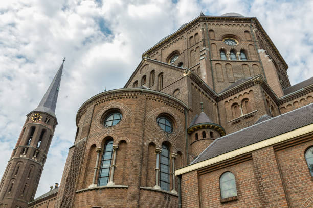 istock Facade Dutch church with windows and towers 876227114