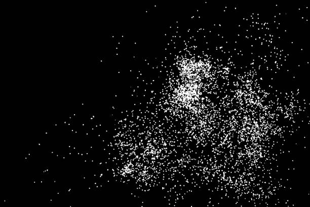 istock Abstract grainy texture isolated on black background. Top view. Dust, sand blow or bread crumbs. Silhouette of food flakes such as salt or almond or wheat flour spread on the flat surface or table. 876229360